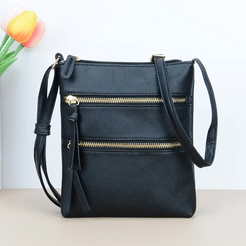 Vegan Leather Bohemian Tassel Zip Sling Bag 1